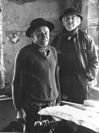 Robert Graves with Mr. Sztokfisz - local Poet carpenter- Bukovina (Changed hats)